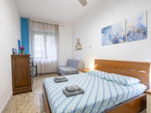 A bed or beds in a room at Studio Fra Cristoforo Studio Apartment by Interhome