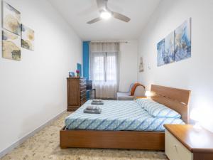 A bed or beds in a room at Studio Fra Cristoforo Studio Apartment by Interhome