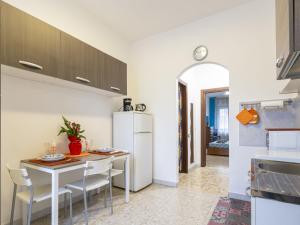 A kitchen or kitchenette at Studio Fra Cristoforo Studio Apartment by Interhome