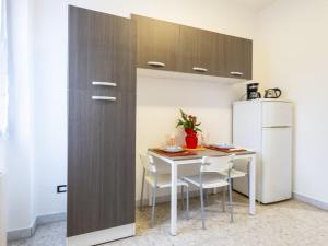 A kitchen or kitchenette at Studio Fra Cristoforo Studio Apartment by Interhome