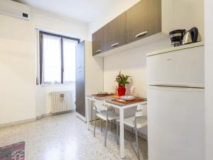 A kitchen or kitchenette at Studio Fra Cristoforo Studio Apartment by Interhome