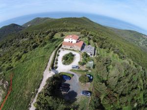 an aerial view of a house on a mountain at Arpaderba B&B in Livorno