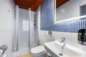 Koupelna v ubytování MEININGER Hotel München Zentrum