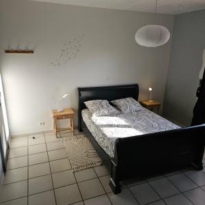Postel nebo postele na pokoji v ubytování La détente ! Petit déjeuner inclus