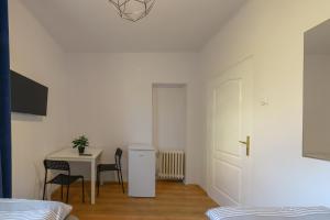 Ένα ή περισσότερα κρεβάτια σε δωμάτιο στο Fotonhouse noclegi Bielsko Biała