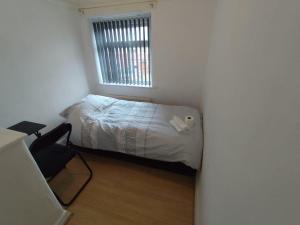 Ένα ή περισσότερα κρεβάτια σε δωμάτιο στο Double Bedroom 78GL1 Greater Manchester +8 φωτογραφίες