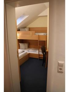Letto o letti in una camera di Gästehaus Elzblick