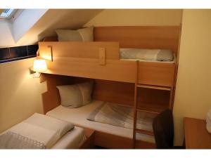 Letto o letti in una camera di Gästehaus Elzblick