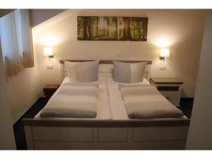 Letto o letti in una camera di Gästehaus Elzblick