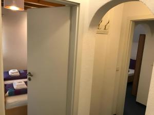 Letto o letti in una camera di Gästehaus Elzblick