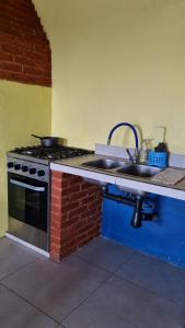 Kuchyň nebo kuchyňský kout v ubytování Matices Hostel Terminal