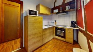 Kuchyň nebo kuchyňský kout v ubytování Zum Bären Duplex - 1 Parking