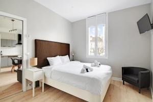 Postel nebo postele na pokoji v ubytování Le Jardin Anglais - 6p - Proche Gare