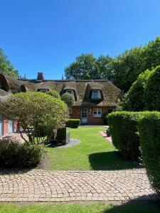 Zahrada ubytování Hus op de Dün SPO ⇒ Erholung in historischem Flair Wattläufer