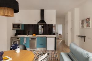 Kuchyňa alebo kuchynka v ubytovaní Apartamentos Líbere Valencia Abastos