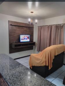 Μια τηλεόραση ή/και κέντρο ψυχαγωγίας στο Condomínio Santa Camila