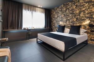 Postel nebo postele na pokoji v ubytování Catania Smart Hotel