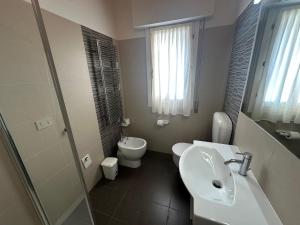 Kúpeľňa v ubytovaní Residence Antares - Agenzia Cocal
