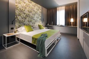 Postel nebo postele na pokoji v ubytování Catania Smart Hotel