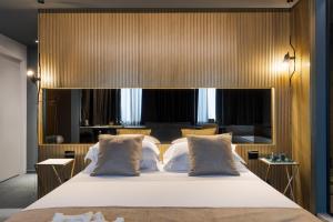 Postel nebo postele na pokoji v ubytování Catania Smart Hotel