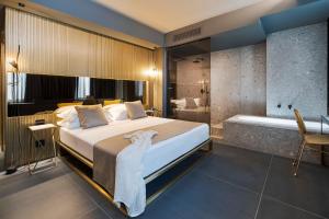 Postel nebo postele na pokoji v ubytování Catania Smart Hotel