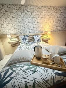 Postel nebo postele na pokoji v ubytování Auberge Desprairies