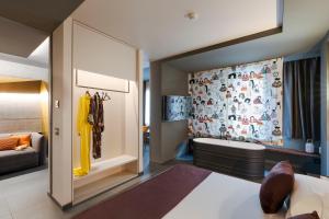 Postel nebo postele na pokoji v ubytování Catania Smart Hotel