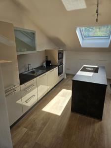 Η κουζίνα ή μικρή κουζίνα στο Ferienwohnung Tegernsee Stern Bei Rottach Egern