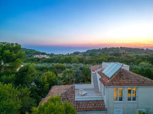 an aerial view of a house with a solar roof at Wunderschöne Villa Gardenia In Istrien in Premantura