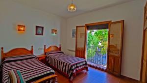 Ένα ή περισσότερα κρεβάτια σε δωμάτιο στο Casa Número 4 +30 φωτογραφίες