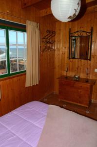 Ένα ή περισσότερα κρεβάτια σε δωμάτιο στο Casa Rural Ondina