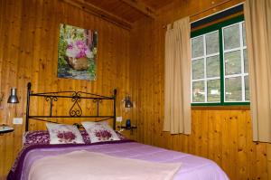 Ένα ή περισσότερα κρεβάτια σε δωμάτιο στο Casa Rural Ondina