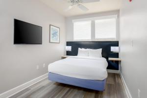 Postel nebo postele na pokoji v ubytování Seaside Amelia Inn - Amelia Island
