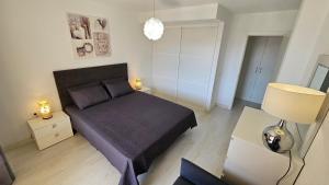 Кровать или кровати в номере Los Cristianos Heated Pool Sea View AC