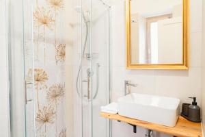 a bathroom with a sink and a shower at Bed & Breakfast AL 171 in Velletri +21 photos
