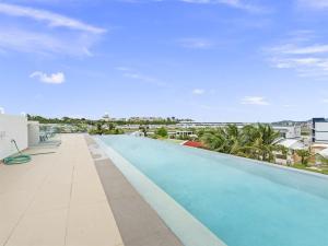 a large swimming pool on top of a building at Beacon Hill Hideaway Luxury Condo in Simpson Bay in Simpson Bay
