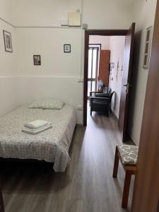 Postel nebo postele na pokoji v ubytování Casa C&S