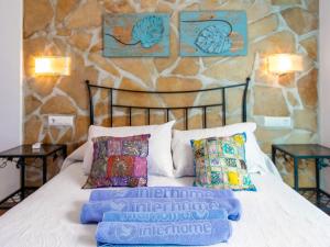 Ein Bett oder Betten in einem Zimmer der Unterkunft Holiday Home Tres Palmeras by Interhome