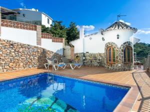 Der Swimmingpool an oder in der Nähe von Holiday Home Tres Palmeras by Interhome