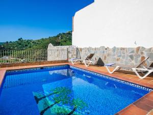 Der Swimmingpool an oder in der Nähe von Holiday Home Tres Palmeras by Interhome