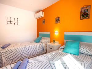 Postel nebo postele na pokoji v ubytování Holiday Home La Era by Interhome