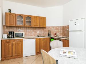 A kitchen or kitchenette at Holiday Home Horvath by Interhome