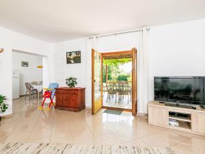 A television and/or entertainment centre at Holiday Home Horvath by Interhome Még 37 kép