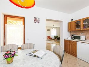 A kitchen or kitchenette at Holiday Home Horvath by Interhome