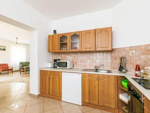 A kitchen or kitchenette at Holiday Home Horvath by Interhome