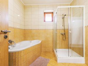 A bathroom at Holiday Home Horvath by Interhome