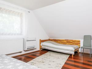 A bed or beds in a room at Holiday Home Horvath by Interhome