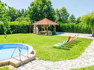 The swimming pool at or close to Holiday Home Horvath by Interhome