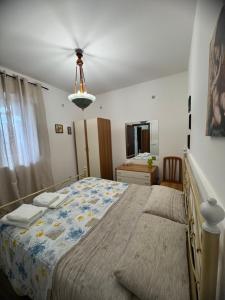 Postel nebo postele na pokoji v ubytování Casa C&S