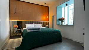 Ένα ή περισσότερα κρεβάτια σε δωμάτιο στο Start Apartments 3 +33 φωτογραφίες